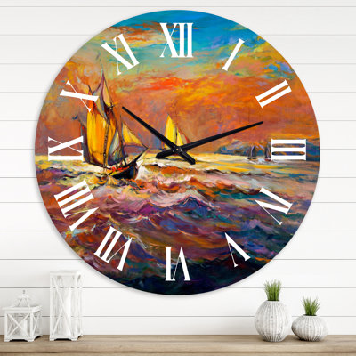 Voiliers sur les vagues de l'océan au coucher du soleil orange - horloge murale nautique et côtière