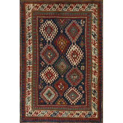 Tapis kazak antique à motif géométrique bleu