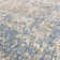 Delanor Abstract Ivory/Blue Area Rug