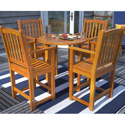 Blaser 4 - Person Wood Patio Dining Set with Round Table