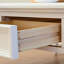 Table basse à quatre pieds avec rangement