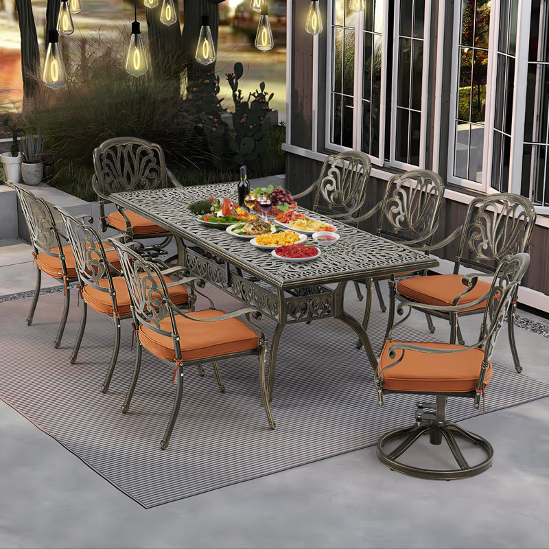 Ashauntae 8 - Person Patio Dining Set with Rectangular Table , Cushions Included