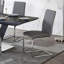 Table de salle à manger moderne de luxe à finition noire avec table extensible 5 pièces et 4 chaises d'appoint avec revêtement en similicuir gris et base en chrome-132846859