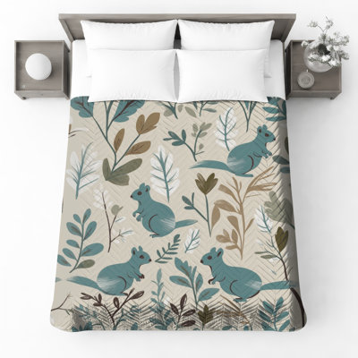 Couvre-lit bleu sarcelle avec écureuils et feuilles