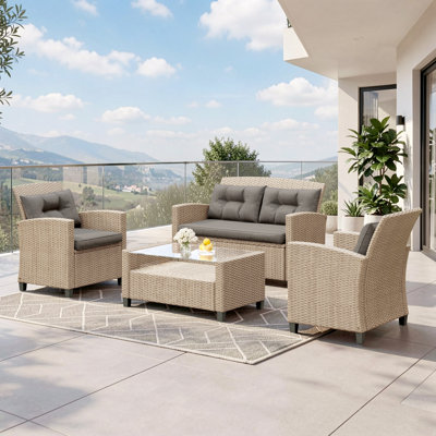 Jett 4 - Person  Wicker / Rattan Outdoor Sofa Seating Group with  Glass-Top Shelf-Storage Table & Cushions