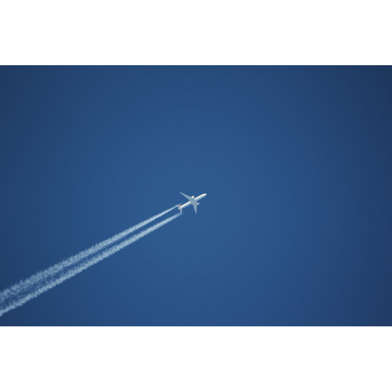 Blue Clear Sky & White Condensation Trail Of An Aircraft by Africanway - Wrapped Canvas Print, 30.48cm H x 45.72cm W