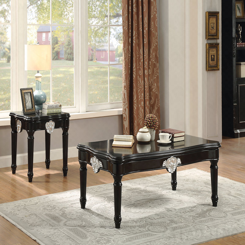 Table basse noire avec pieds tournés