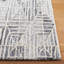 Tapis géométrique ivoire / gris en laine et viscose touffetés à la main Ebony-769233931