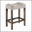 Ensemble table haute de bar cinq pièces avec tabourets capitonnés pour des repas élégants et des réceptions conviviales à la maison-313325283