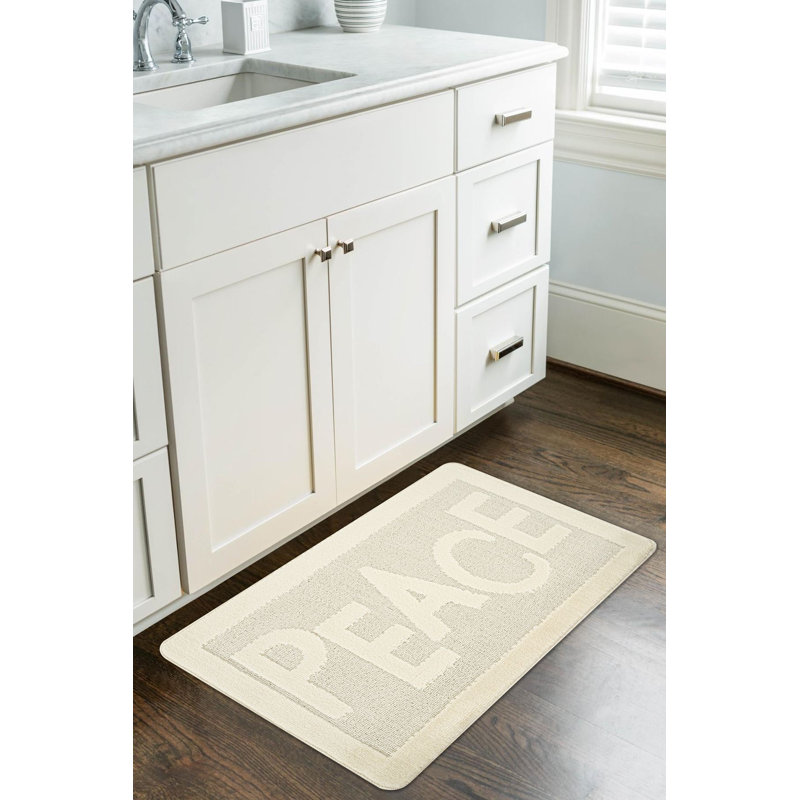 Tapis de bain luxueux crème, 23,6 po x 39,4 po | 100% polypropylène, 1,3 lb / pi³ | Semelle antidérapante en latex naturel, velours de 0,5 mm et hauteur de l'éponge | Lavable à la machine, parfait pour la sécurité et le confort de la salle de bain