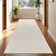 Tapis moderne avec motif de lignes minimalistes crème