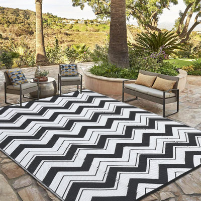 Tapis d'extérieur moderne en paille réversible 8 x 10 en paille Chervon