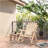 Outsunny Outdoor Wooden Rocking Chair, Single-Person Rustic Adirondack Rocker With Slatted Seat, High Backrest, Armrests For Patio, Garden And Porch, Natural