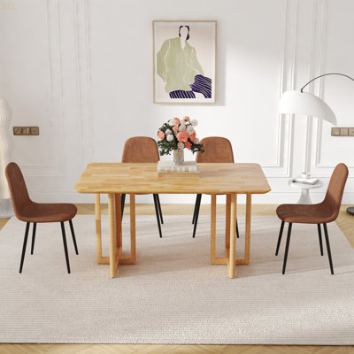 Ensemble de table et de chaises. Table de salle à manger de style antique, pieds de table en imitation rotin. 4 chaises confortables en tissu avec pieds en métal noir. Pour le dîner, les réunions, la maison et le bureau.