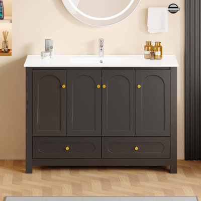 Meuble-lavabo de grande capacité avec plusieurs portes et tiroirs à fermeture douce, équipé d'un lavabo en résine