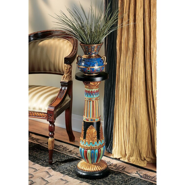 https://assets.wfcdn.com/im/40547732/resize-h755-w755%5Ecompr-r85/9371/9371186/Regal+Egyptian+Luxor+Plant+Stand.jpg