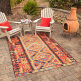 Tapis d'intérieur / extérieur en polypropylène tissé à la machine Lidio - rouge / jaune / bleu