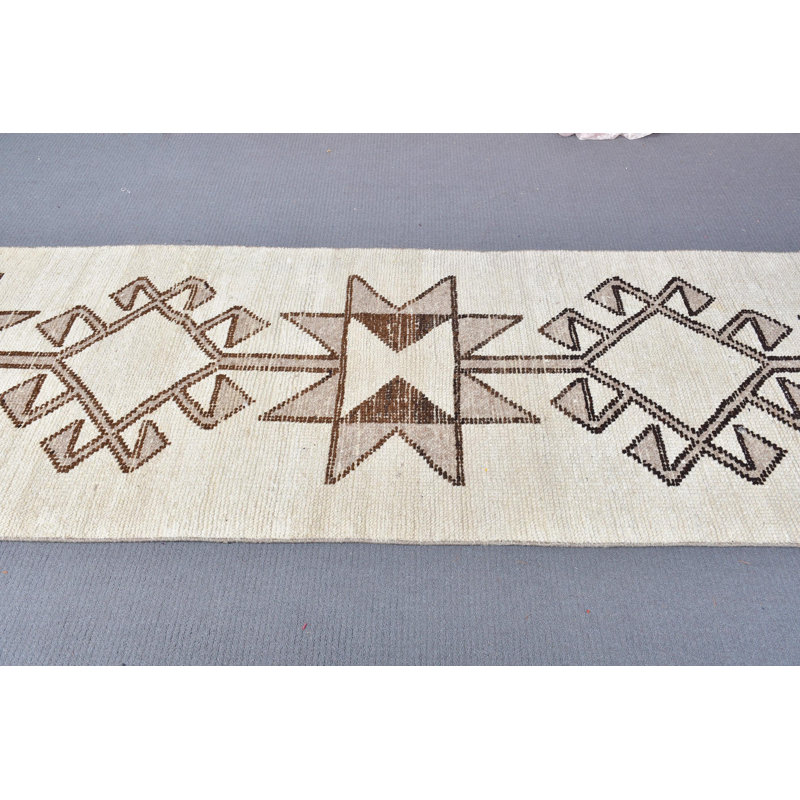 Tapis de couloir classique en laine beige