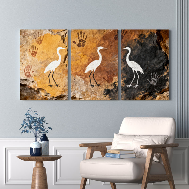 Ensemble de 3 tableaux sur toile tendue représentant un héron blanc et une empreinte de main dans une grotte
