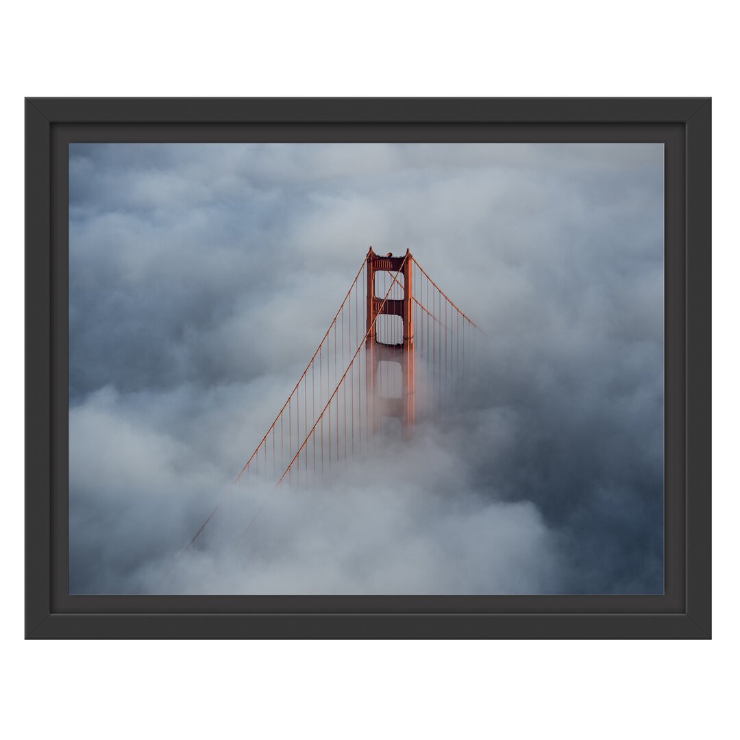 Gerahmtes Wandbild Golden Gate Bridge über den Wolken