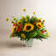 Sunflower and Ranunculus arrangement in Ceramic Vase