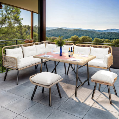 Besa Rectangular 9 - Person 47.2" Long Dining Set with Cushions