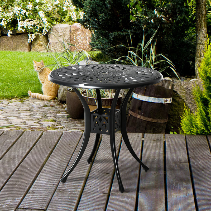 Table de salle à manger ronde de 76 cm (30 po) avec trou pour parasol, en aluminium moulé antique noir. Structure robuste et plateau stable. Parfait pour les repas en extérieur.
