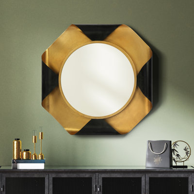Miroir mural rond sur cadre octogonal en feuille d'or avec cadre en métal enroulé