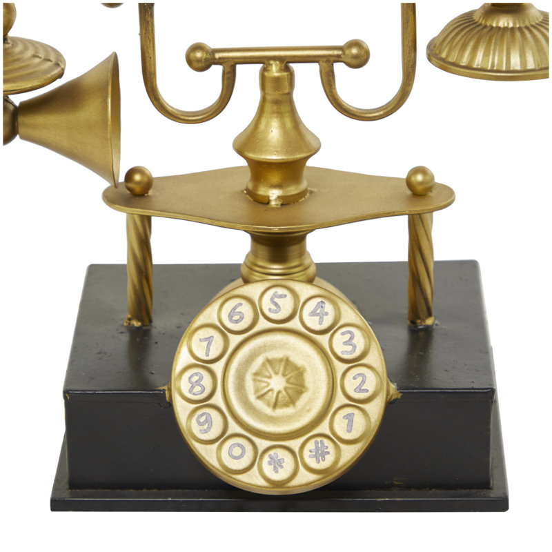 Sculpture en métal téléphone or