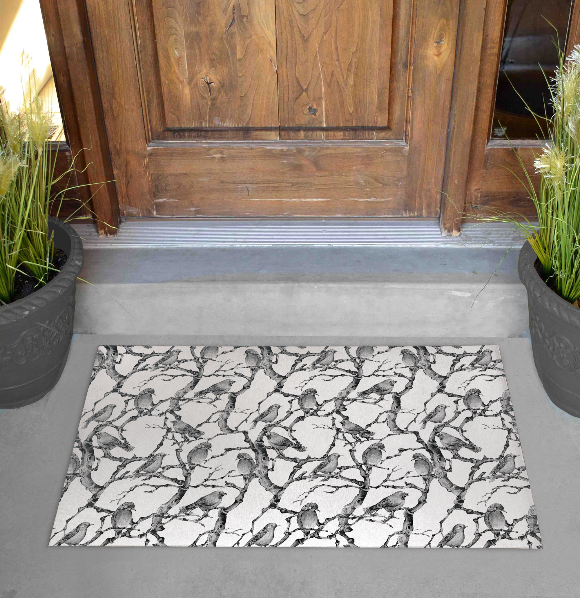 https://assets.wfcdn.com/im/40597259/compr-r85/1535/153583666/barak-non-slip-animal-print-outdoor-doormat.jpg