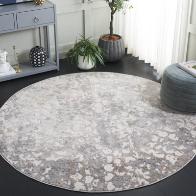 Esterley Abstract Area Rug in Ivory/Gray