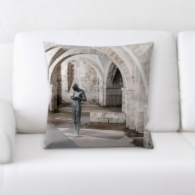 Coussin statue
