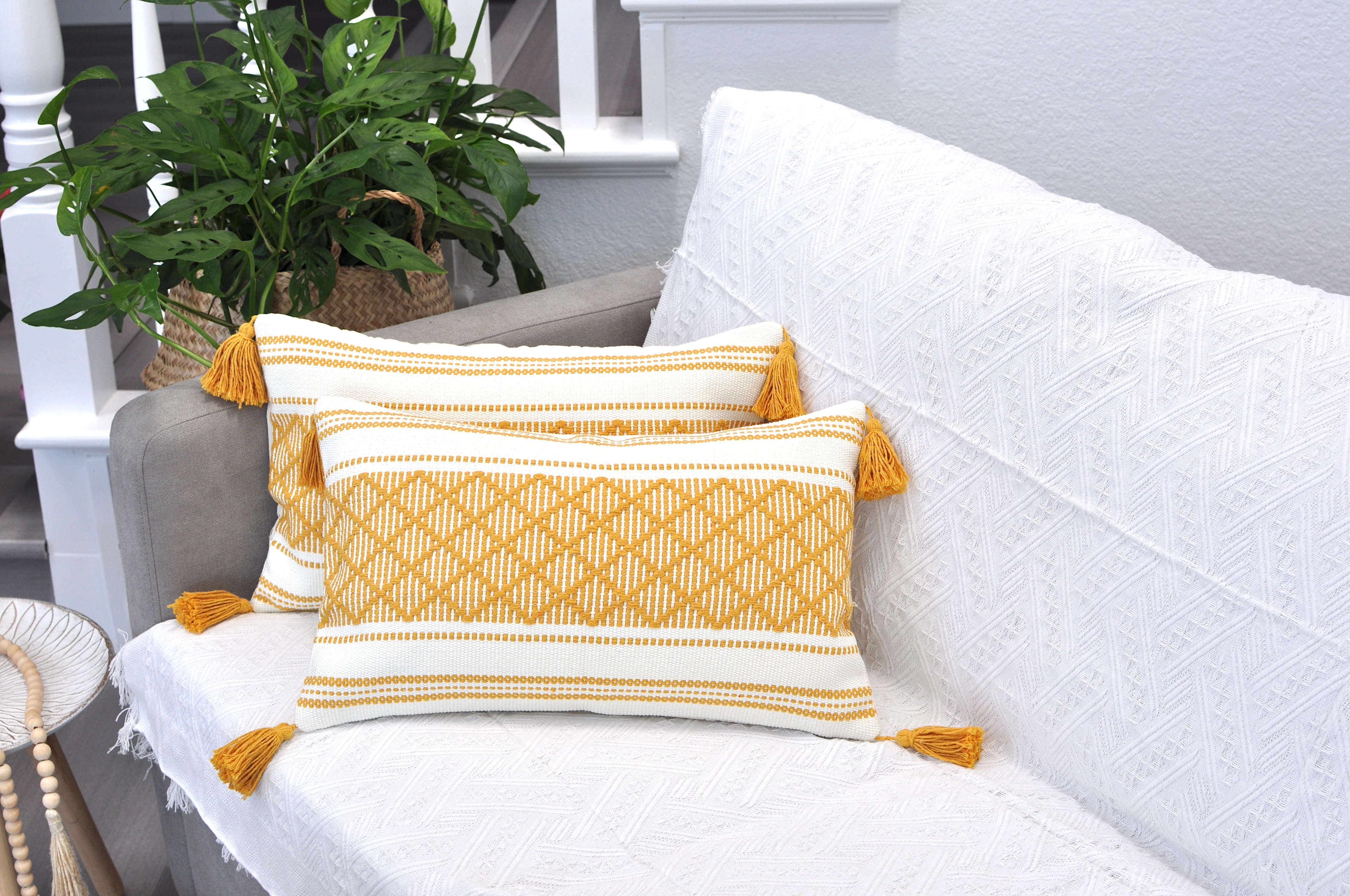 https://assets.wfcdn.com/im/40608206/compr-r85/2150/215059792/percey-boho-lumbar-pillow-covers-with-tassels-cotton-woven-rectangular-pillowcases.jpg