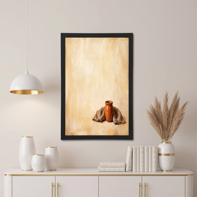 Art mural en toile terre cuite reposant sur toile taupe drapée