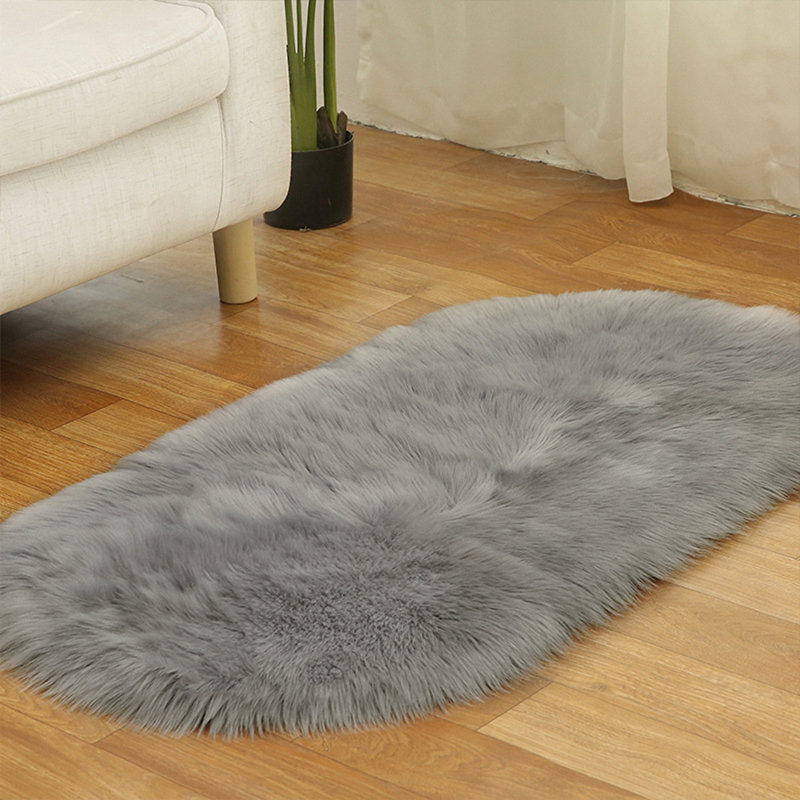 Oval Solid Colour Faux Sheepskin 120cm X 60cm Area Rug