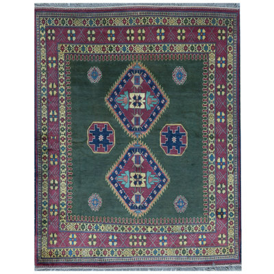 Tapis vert noué à la main de haute qualité