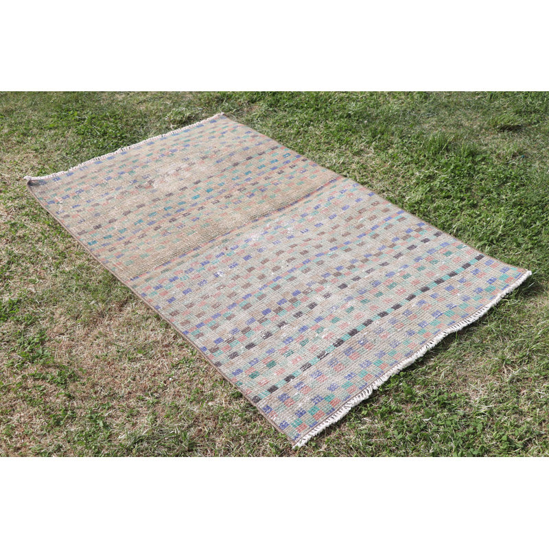 Petit tapis turc beige vintage rétro idéal pour les cuisines et ajoutant une touche d'élégance antique