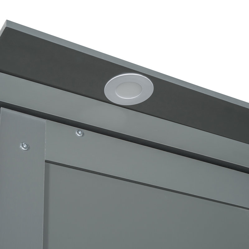 Lit escamotable gris avec canapé, peu encombrant, de conception moderne, pour une utilisation multifonctionnelle