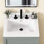 Plan de toilette en surface solide de 61 cm (L) × 56 cm (P) avec lavabo central simple intégré, blanc, dosseret de 9 cm et 3 trous prépercés pour robinetterie à entraxe de 20 cm.