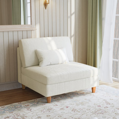 Fauteuil rembourré en velours côtelé beige avec dossier coussiné Seemab