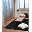 Tapis noir en peau de vache Aayush