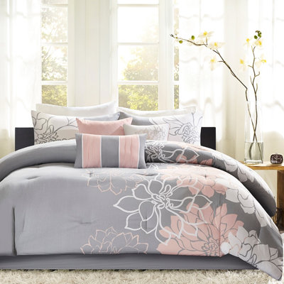 Couette en coton imprimé King Size - Gris/pêche avec rembourrage et oreillers à motifs.