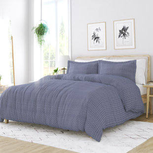 https://assets.wfcdn.com/im/40651226/resize-h310-w310%5Ecompr-r85/2390/239080243/palomino-blue-diamond-pattern-duvet-cover-set.jpg