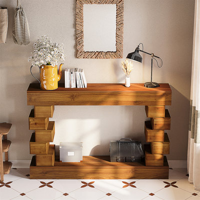 Geometric Block Stacked Wood Console Table With Modern Artistic Design And Natural Wood Grain Finish.
