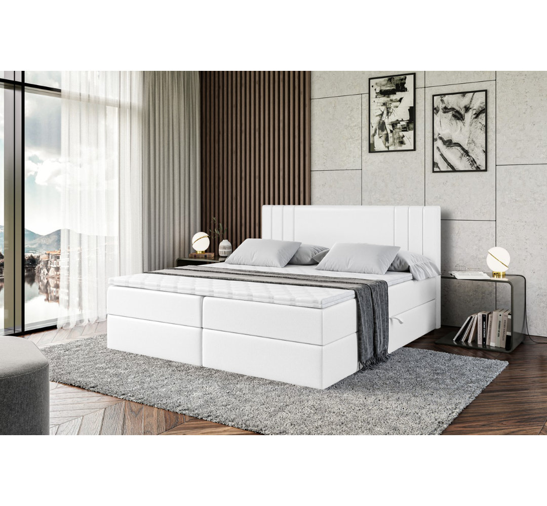 Boxspringbett Anniqua in Kunstlederoptik mit H4 Multipocket-Matratze, Bettkasten und Topper