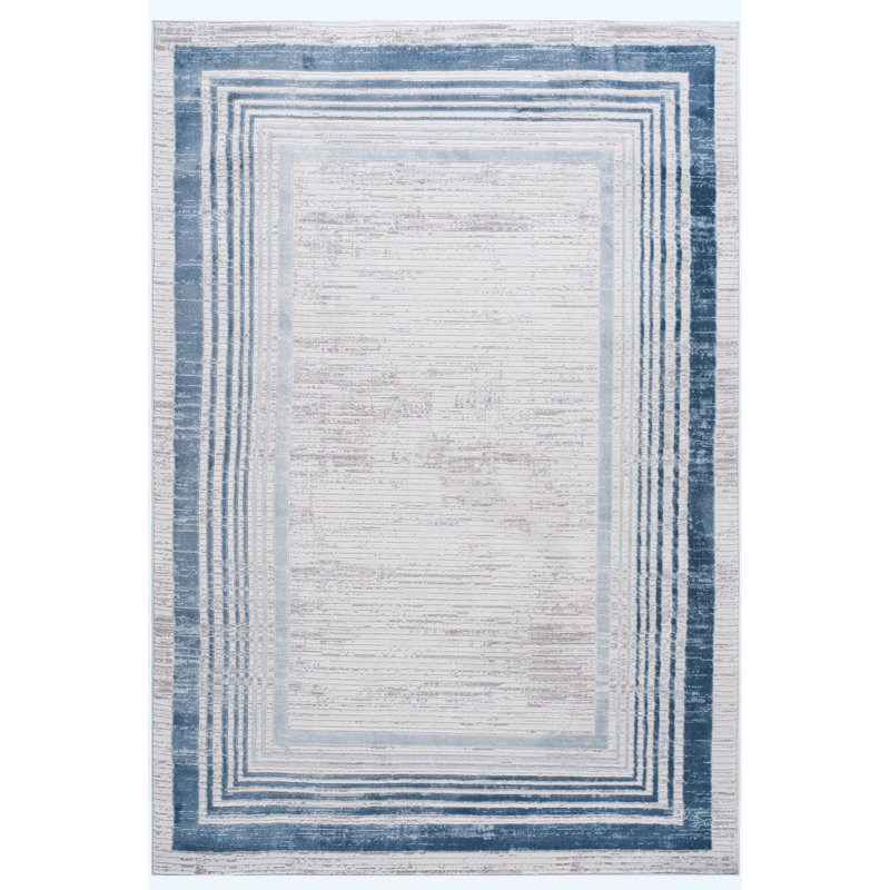 Tapis ivoire moyen à bordure en fibres synthétiques résistant aux taches et à la perte de poils 5 pi x 7 pi