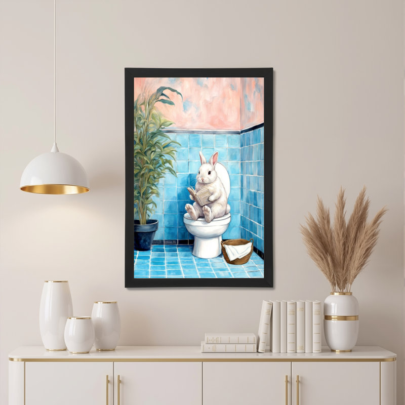 Tableau mural en toile représentant un lapin lisant sur les toilettes, H 18 po x l 12 po