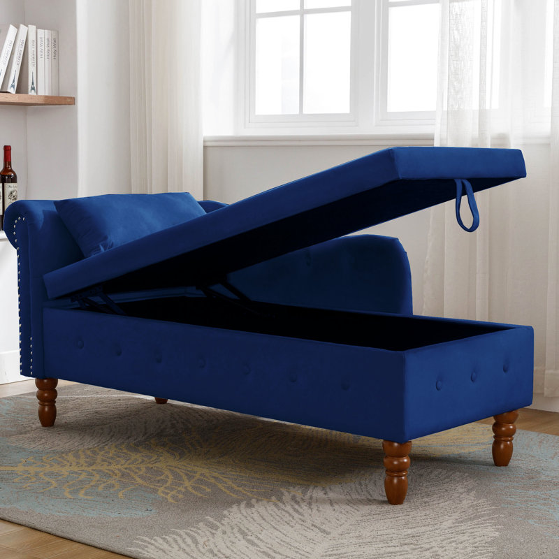 Chaise longue de salon confortable avec velours et support dans un espace de rangement caché bleu marine