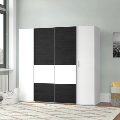 Aguayo 4 Door Manufactured Wood Wardrobe