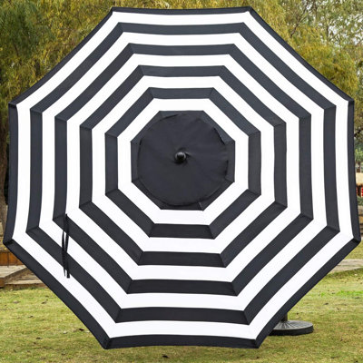 Parasol de table de patio 9 pi noir et blanc avec 8 nervures durables et un poteau épais de 1,5 pouce, structure stable pour une utilisation extérieure à long terme.